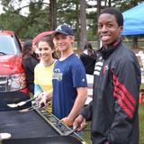Fayetteville Academy Photo #8 - The Fayetteville Academy Student Government Association members grill hamburgers at Senior Night to sell as a fundraiser.