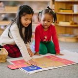 Greensboro Montessori School Photo #3 - In our Primary classrooms featuring 3-, 4-, and 5-year-olds, kindergartners are both leaders and scholars, acquiring mastery by giving lessons to younger friends.