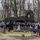 St. Bernadette School Photo #1 - Students participated in a virtual pilgrimage to Lourdes by visiting our on-campus grotto.