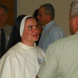 St. Gertrude School Photo #2 - Sr Gianna, O.P., discusses Junior High procedures with a parent at a "Back to School" night. The sister teaches Religion to 6th, 7th, and 8th grade students.