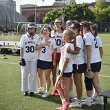 St. Mary 's Academy Photo - Senior lacrosse players signing the national anthem during their senior night game. St. Mary 's Academy Photo - Senior lacrosse players signing the national anthem during their senior night game.