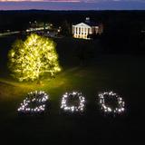 Western Reserve Academy Photo #4 - Our Bicentennial Tree sparkles with 75,000 string lights as hundreds of students gather in a glowing "200" to celebrate two centuries of Reserve tradition.