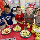 Metro Christian Academy Photo #1 - Peeling, chopping, and stirring up sweet memories! Kindergarten little chefs had fun making homemade applesauce!