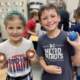 Metro Christian Academy Photo #6 - 2nd graders got creative with clay to model the layers of the Earth. From the crust to the core, students shaped their understanding of our planet's structure!