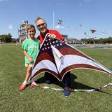 Metro Christian Academy Photo #13 - High-flying fun! PreK students and their dads spent an afternoon soaking up the sunshine, running across the field, and sending their kites high into the sky.