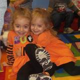 Newtown KinderCare Photo #9 - Two KinderCare students get ready to read a story!