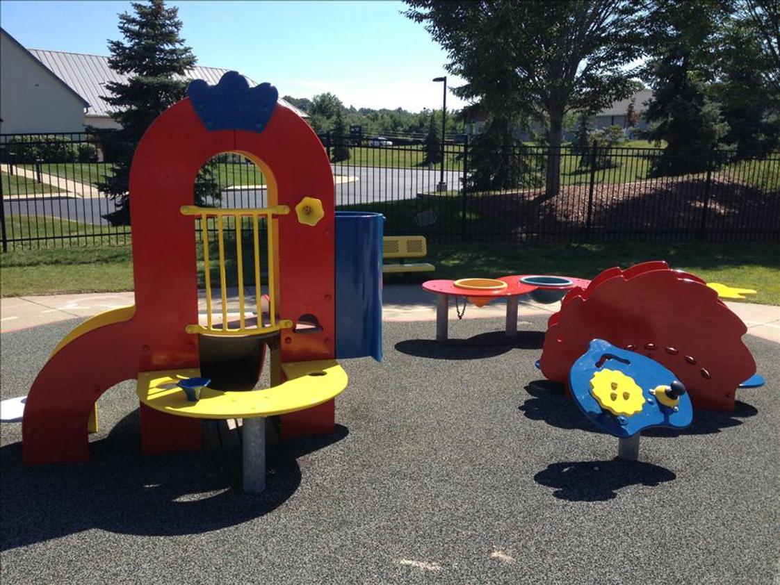 Kinder Care Learning Center Photo #1 - Infant/Toddler/Discovery Preschool Playground: We make sure our little ones are building their muscles as well as their minds!
