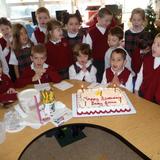 St. Rose Of Lima School Photo - The St. Rose of Lima School Kindergarten celebrated the birthday of baby Jesus with a special cake and song.