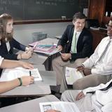 The Hill School Photo #3 - Student engage in a discussion with their teacher in a Hill English class.