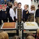 Nativity School Photo #3 - Our students, faculty, and staff celebrating our 60th anniversary with cake!