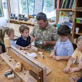 The Bright School Photo #3 - Believing in acquired knowledge application, Bright's woodworking shop offers hands-on experiences literally! Each child has an opportunity to experience the process of taking raw wood and creating a work of art.
