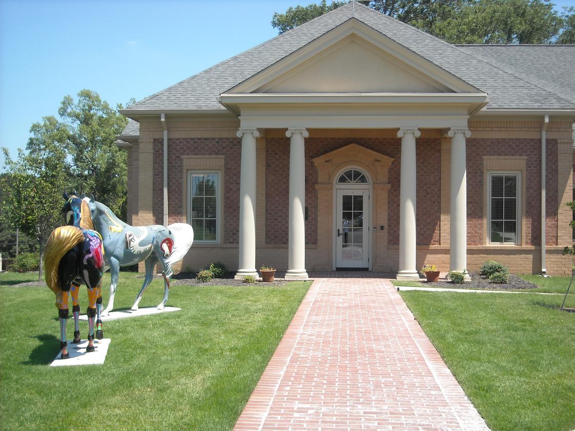 Memphis Oral School For The Deaf Photo #1 - The Front Door of Memphis Oral School for the Deaf is always noticed from the road by the two painted horses stationed on our front lawn. These horses were donated by patrons of the Germantown Horse Show.