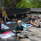Sumner Academy Photo #1 - Pre-kindergartners enjoy art class in our outdoor classroom, a great place for art and other activities for students of all ages.