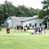 Summit Christian Academy - Cedar Park Campus Photo - Students enjoy green spaces on the Summit campus while transitioning from class to class.