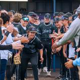 Liberty Christian School Photo #2 - Upper School baseball players celebrate on Senior Night with player introductions while surrounded by members of their family. What a special night!