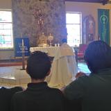 Resurrection Catholic School Photo #4 - Adoration of the Eucharist during an all-school Mass