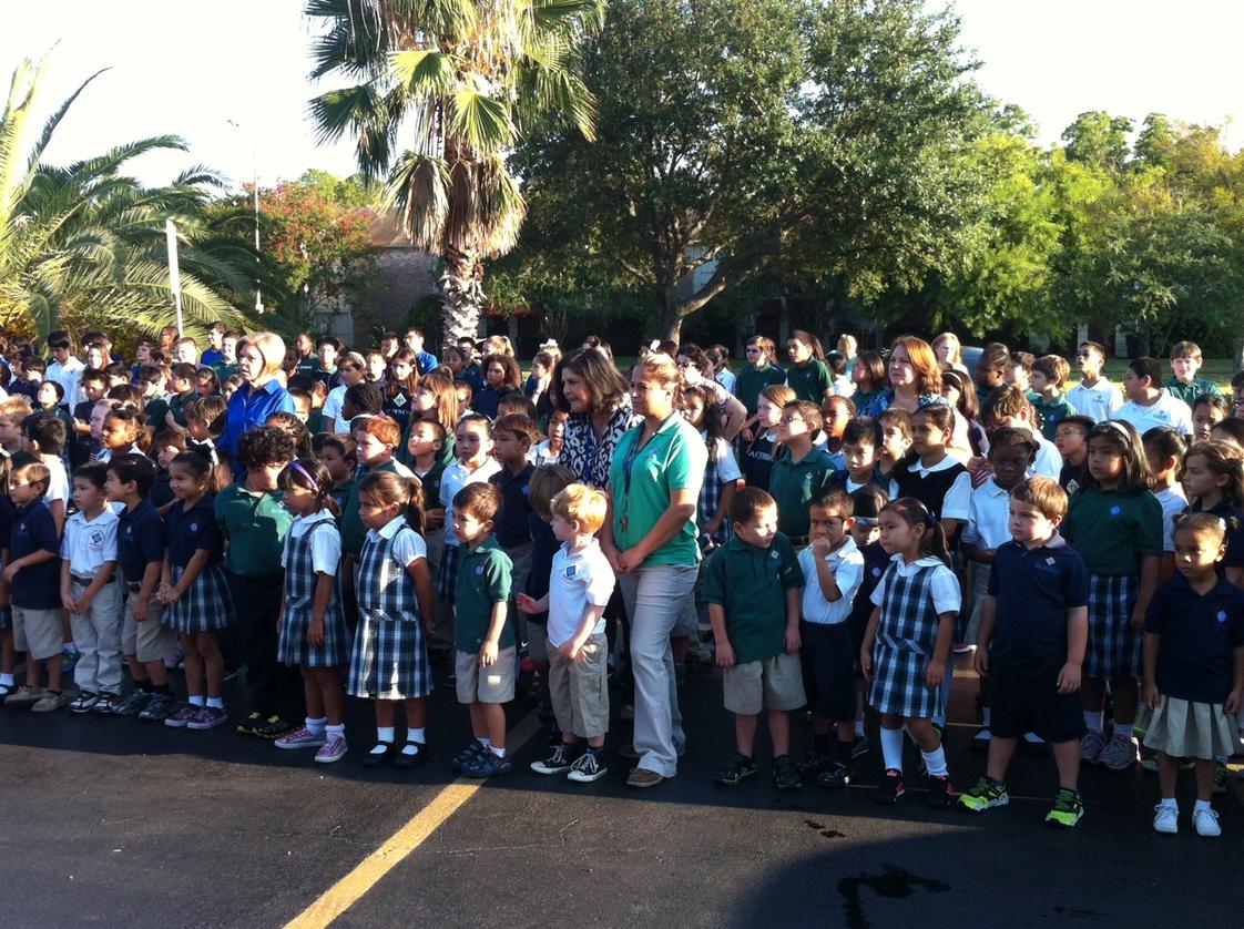 St. Jerome Catholic School Photo #1 - All students, teachers, faculty and staff attend the annual Flag Ceremony. Held every September, the students are taught the importance of respecting our Flags, country and the men and women who fought for all of us.