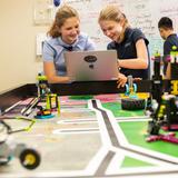 St. Francis Episcopal School Photo #10 - Middle School students working on their coding for robotics.