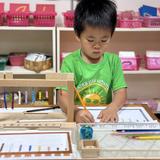 Country Day Montessori School Photo #2 - Primary focus with pink work