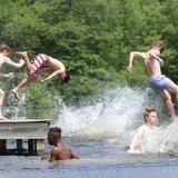 Blue Ridge School Photo #5 - Seniors celebrate their graduation by jumping into the lake.
