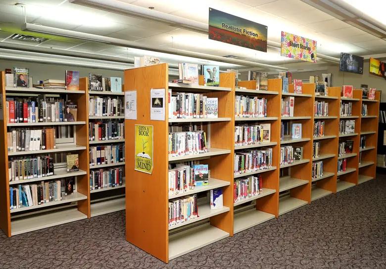 Catholic High School Photo #2 - Welcome to the Shepherd Library and Media Center! Students can use desktop computers, printers, and the Makerspace to assist in their creative process or simply study, collaborate or sharpen their minds with a puzzle or board game!
