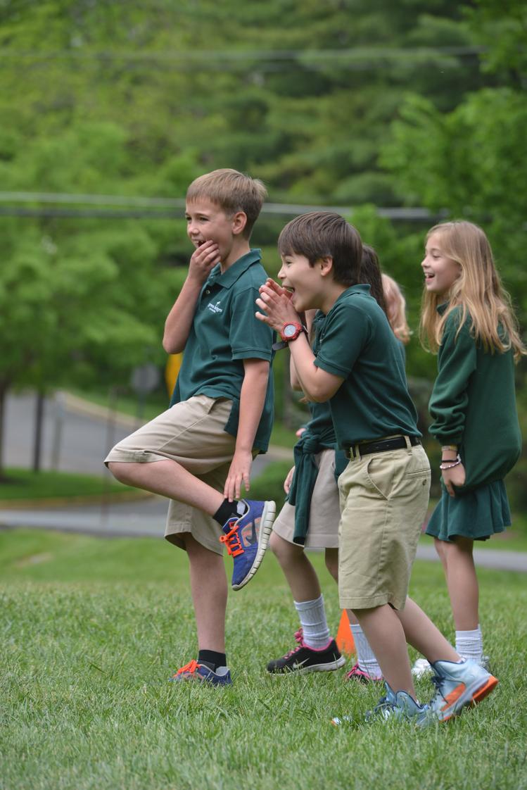 Green Hedges School Photo - Grade 3 students cheer on their classmates during P.E.