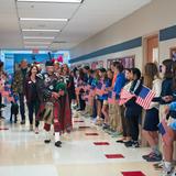 Loudoun Country Day School Photo #6 - One of the traditions at LCDS is our yearly celebration of Veterans Day, honoring our veterans and active members of the armed forces. We do a flag raising ceremony and enjoy an assembly filled with music and tributes to them.