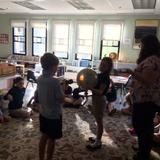Montessori School Of Mclean Photo #6 - Lower Elementary students learning about the sun and the rotation of the Earth