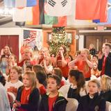 Wakefield County Day School Photo #1 - WCDS's 50+ year history blends academic excellence with time-honored traditions. Seen here, the Lower School grades do their part in singing the Twelve Days of Christmas one of several beloved Assembly traditions among the Lord of the Dance, Planets of the Sun, Alligator Stomp, and more.