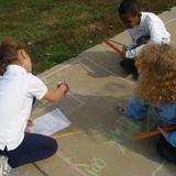 Prince William Academy Photo #2 - Learning takes a hands-on approach as students measure and calculate the perimeter and area of shapes on the sidewalk.