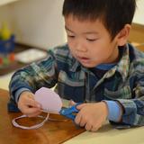 Cedar River Montessori School Photo #4 - learning to use scissors