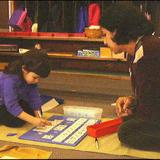 Montessori In Motion Photo - Primary child at work.