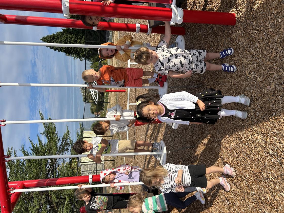 Our Lady Of Lourdes Catholic School Photo #15 - Preschoolers enjoying the "red" play structure.