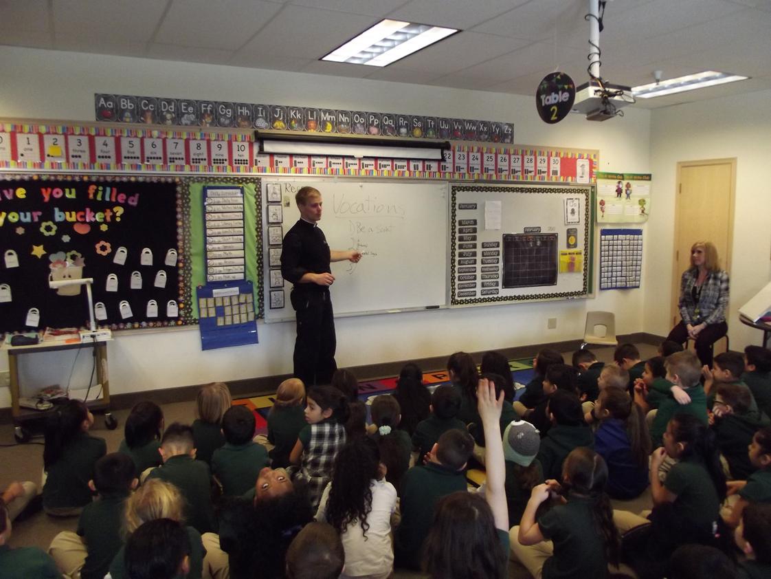 St. Patrick Catholic School Photo #1 - Father Tuckerman sharing with our school about his vocation.
