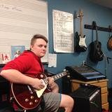 The Clearwater School Photo #7 - Playing guitar in the music room.