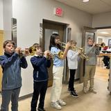 Brookfield Academy Photo #13 - Lower School musicians play a fanfare to begin Roman Day festivities for Level 4 students.