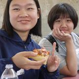 North Hills Christian School Photo #3 - Our international students enjoying a "peace" of pizza at our Middle and High School New Student Orientation.