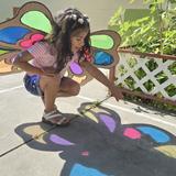 OC Kids Infant & Preschool Photo #24 - Our Butterfly Unit is always a favorite of our children. We observe our own classroom caterpillar, learn all about its metamorphosis, and also our math, science, and art will encompass our there. Here you can see a fun activity where children learned about color and light with our butterfly wings.