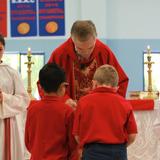 Our Lady of Lourdes Parish School Photo #4 - Weekly school Mass with Fr. Matt.