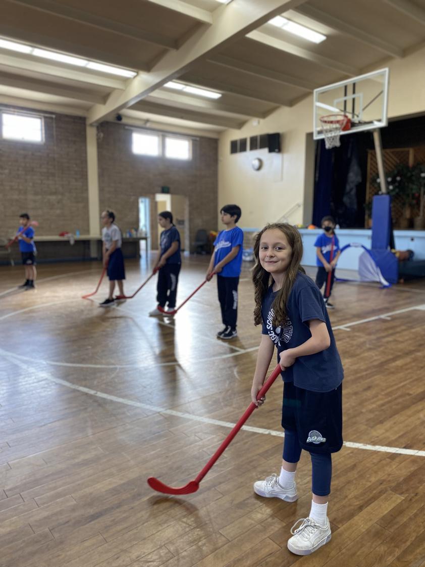 Our Mother Of Good Counsel School Photo - Floor Hockey During PE