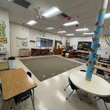 Peninsula Montessori School - Palos Verdes Campus Photo #5 - Classroom with Montessori shelves and open floor space for independent work