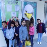 South Hills Academy Photo #2 - Students gathered around South Hills Academy's mascot, Baldwin the Eagle.