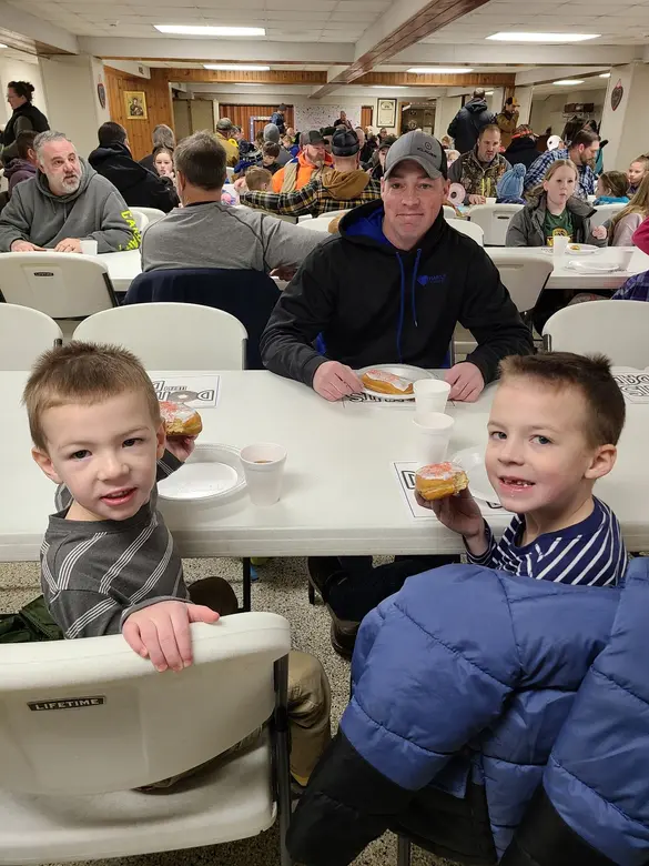 St. Patrick's School Photo #2 - Donuts with Dad-A yearly tradition at St. Patrick's inviting all of our dads, grandpas, uncles, and father figures to join their students for donuts before school!
