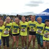 Star Of Bethlehem Lutheran School Photo - Runners celebrate their finish after a cross country meet.