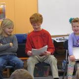 The Village School Photo #4 - Village School Reading Buddies share aloud the poems they wrote together.