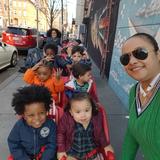 Genesis Educational Center Photo - Tiny Tots going for a stroll around the neighborhood with Mrs. Kandie!