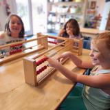 Crestmont School Photo #3 - Our first graders are learning how to use an abacus while having a lot of fun!