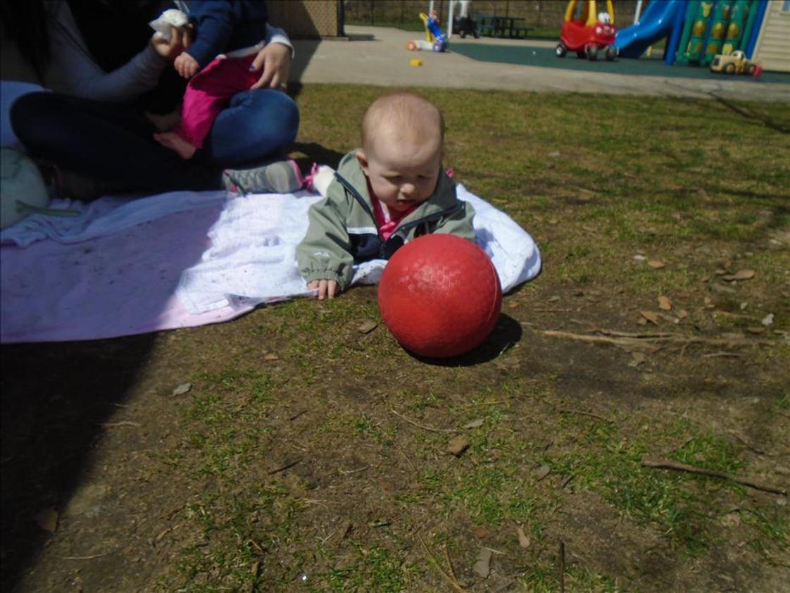 Monroe KinderCare Photo - This is Ella one of our infants practicing tummy time outside on a beautiful day.