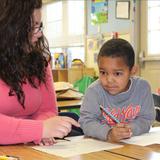 Fox Valley KinderCare Photo #7 - Assessment of reading and writing skills is just one of many components utitlized in the Kindergarten classroom to assure school readiness.