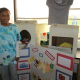 Harbour School At Baltimore Photo #9 - Harbour students are proud of their work and show it off to family and friends. Learning through doing helped this student realize the difference that technology has made in all of our lives.